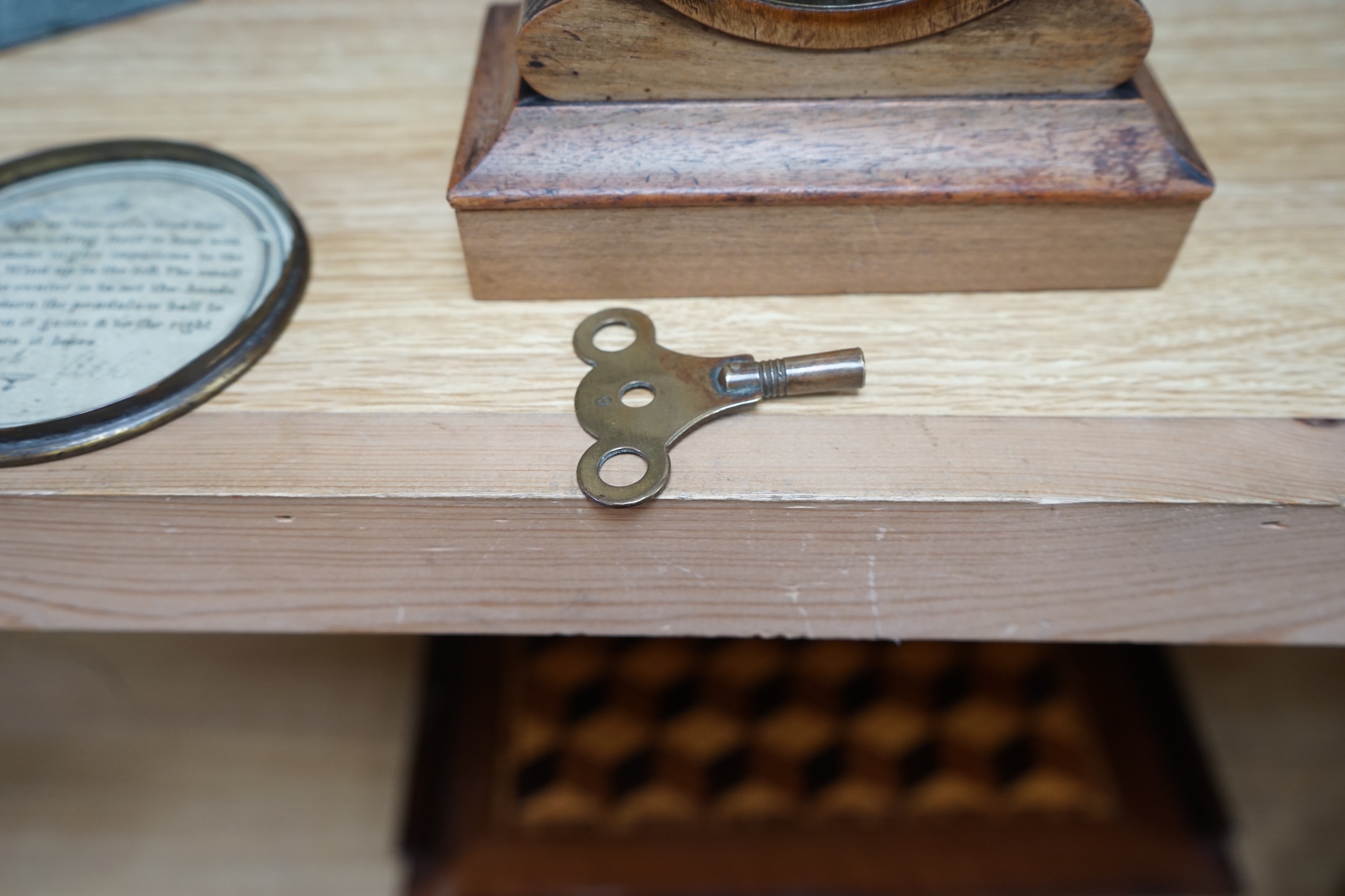 A French tic-tac movement timepiece, 19th century, in a walnut case, 15.5cm high. Condition - fair.